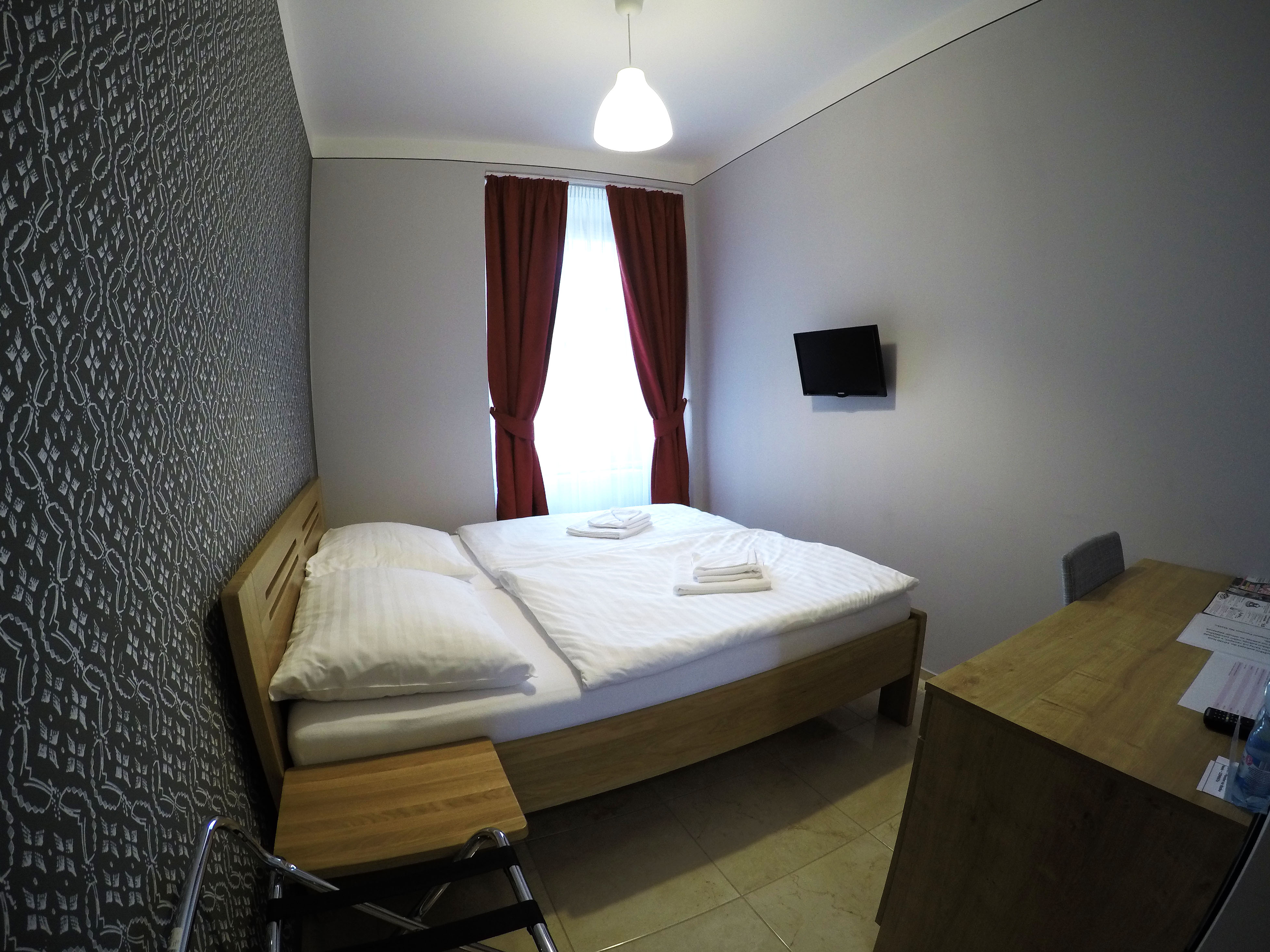 Dvoulůžkový pokoj typu Economy s manželskou postelí